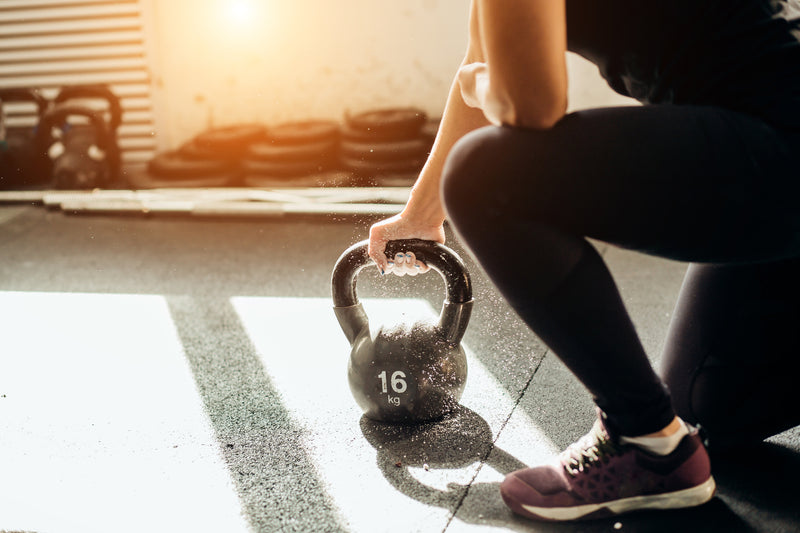 woman-lifting-kettlebell-workout